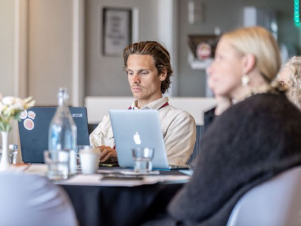 Two educators in discussion at a professional learning session